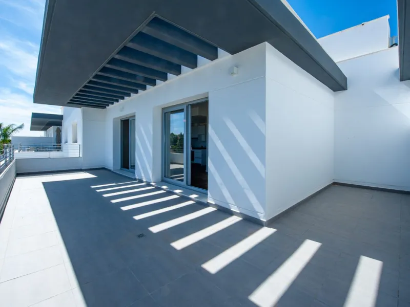 Move-in ready, brand new, modern, top-floor apartment for sale in a golf urbanization near Estepona town