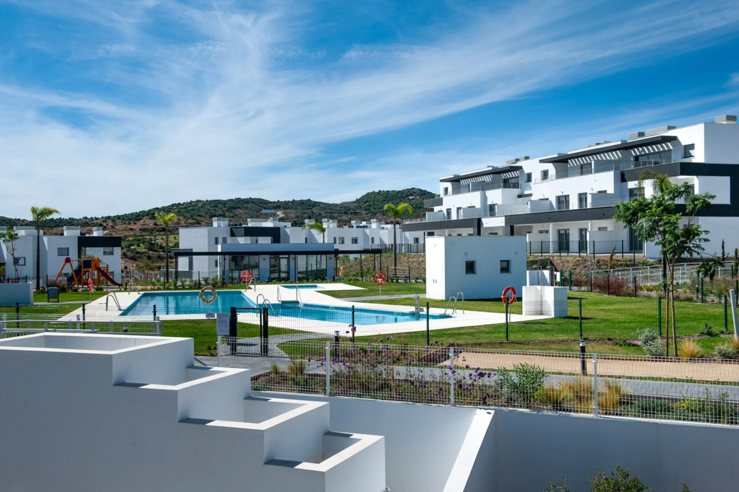 Move-in ready, brand new, modern, top-floor apartment for sale in a golf urbanization near Estepona town
