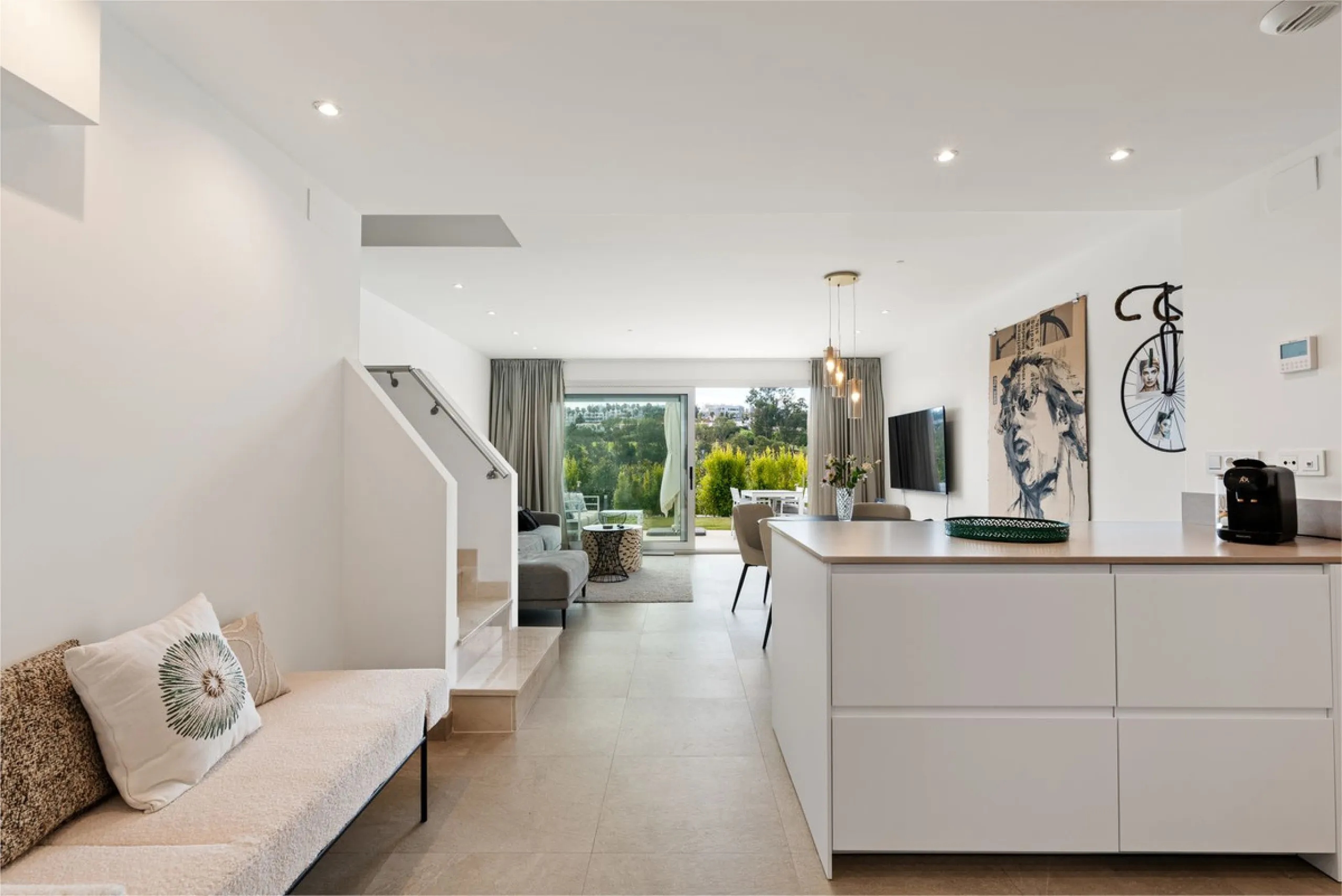 This modern townhouse is located in the newly constructed development, nestled within the renowned Estepona Golf area. The property enjoys a prime location, just a short drive from the beach, shopping, dining, and various amenities, making it ideal for pe