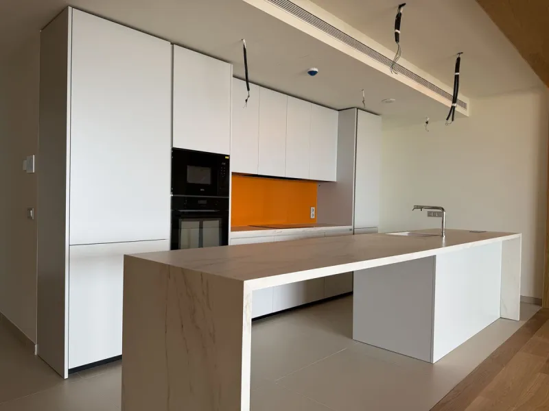 Be among the very first to reserve this stunning brand-new, just-completed 3-bed, 2-bath apartment. Spread across 140 m² built, the open-plan living and kitchen area is bright and spacious, with floor-to-ceiling sliding glass doors that seamlessly extend 