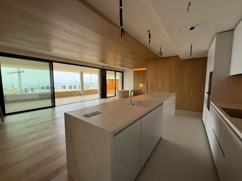Be among the very first to reserve this stunning brand-new, just-completed 3-bed, 2-bath apartment. Spread across 140 m² built, the open-plan living and kitchen area is bright and spacious, with floor-to-ceiling sliding glass doors that seamlessly extend 
