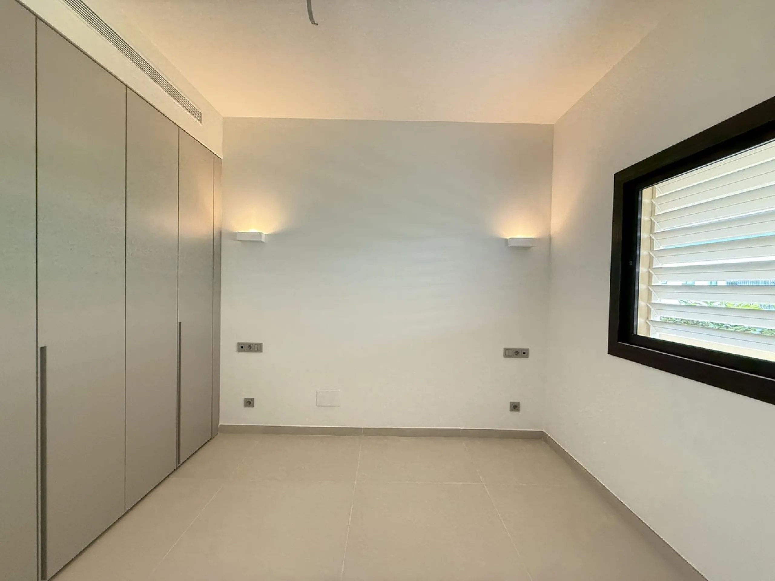 Be among the very first to reserve this stunning brand-new, just-completed 3-bed, 2-bath apartment. Spread across 140 m² built, the open-plan living and kitchen area is bright and spacious, with floor-to-ceiling sliding glass doors that seamlessly extend 