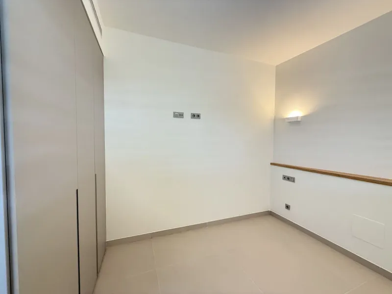 Be among the very first to reserve this stunning brand-new, just-completed 3-bed, 2-bath apartment. Spread across 140 m² built, the open-plan living and kitchen area is bright and spacious, with floor-to-ceiling sliding glass doors that seamlessly extend 