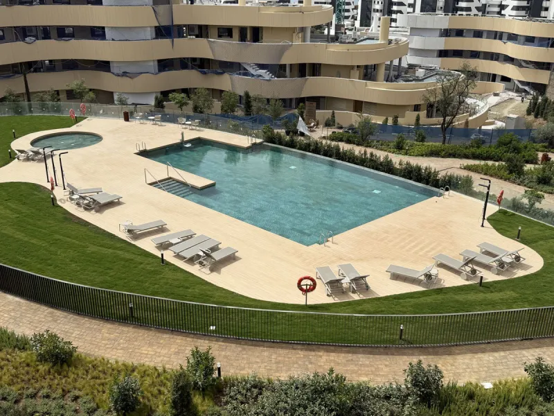 Be among the very first to reserve this stunning brand-new, just-completed 3-bed, 2-bath apartment. Spread across 140 m² built, the open-plan living and kitchen area is bright and spacious, with floor-to-ceiling sliding glass doors that seamlessly extend 
