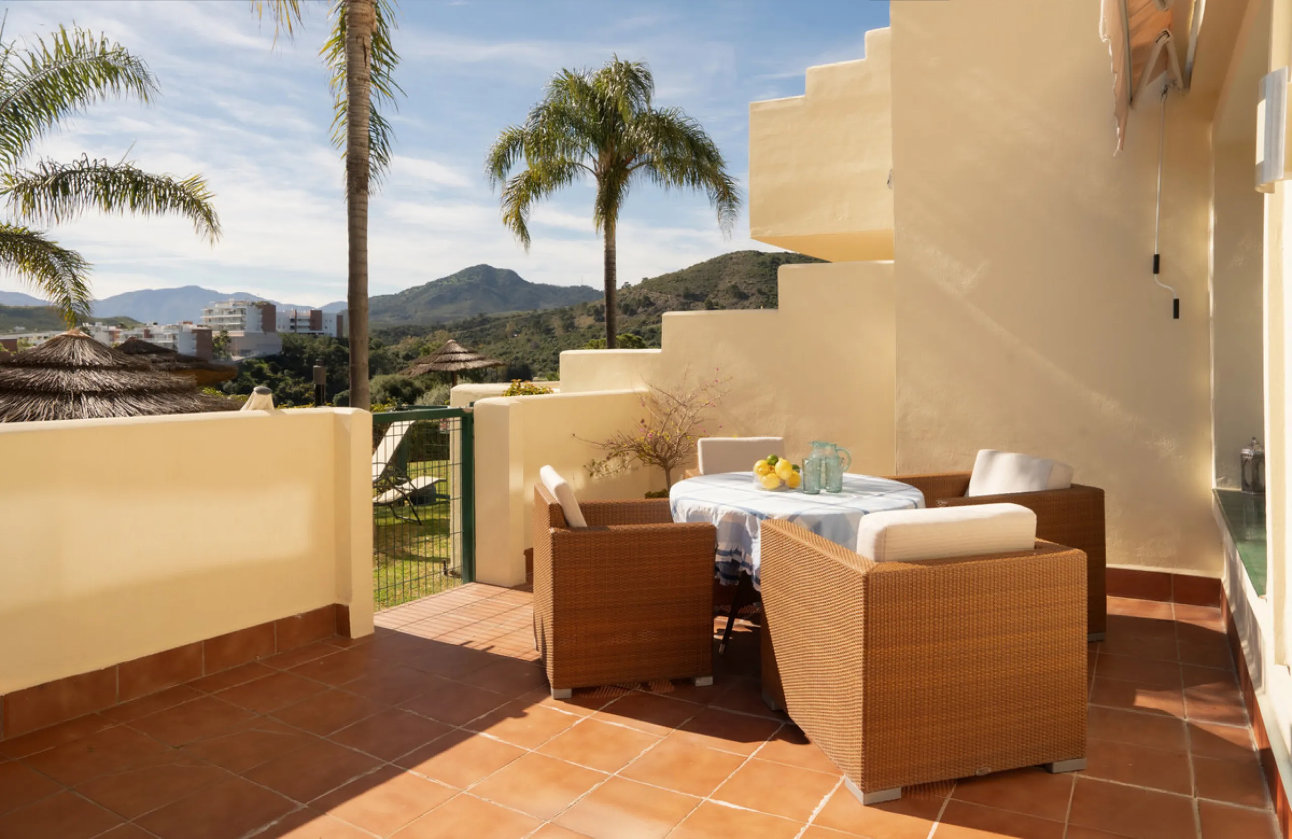 This bright and spacious 2-bedroom, 2-bathroom apartment offers comfortable living in a secure gated community. The property features a large 39 m² southwest-facing terrace overlooking landscaped gardens and the communal pool, perfect for outdoor dining, 