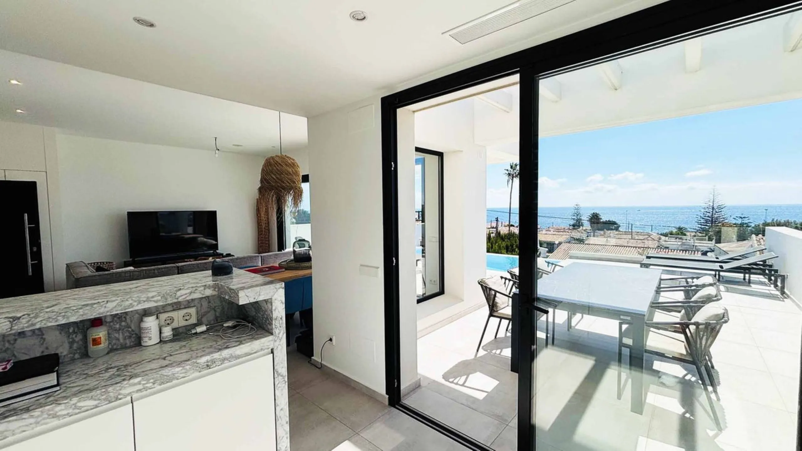 MODERN VILLA WITH SEA VIEWS JUST 200 METERS FROM THE BEACH FOR SALE IN EL CHAPARRAL, MIJAS COSTA
