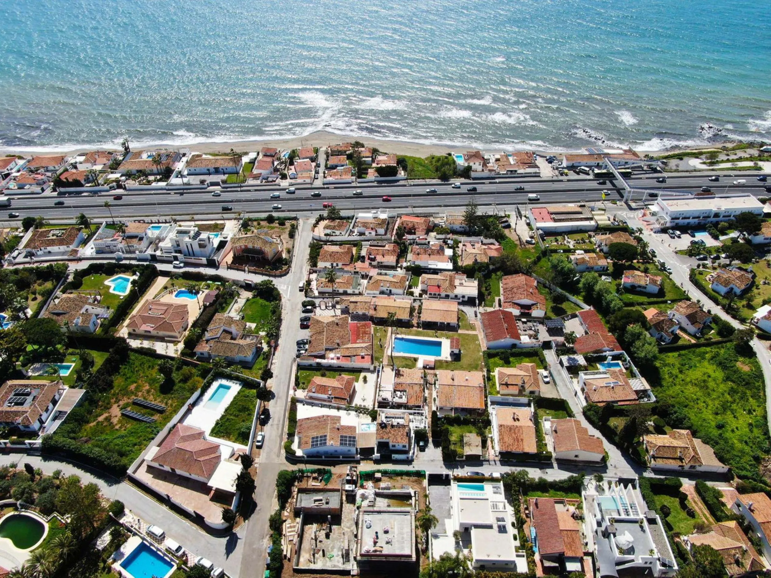 MODERN VILLA WITH SEA VIEWS JUST 200 METERS FROM THE BEACH FOR SALE IN EL CHAPARRAL, MIJAS COSTA
