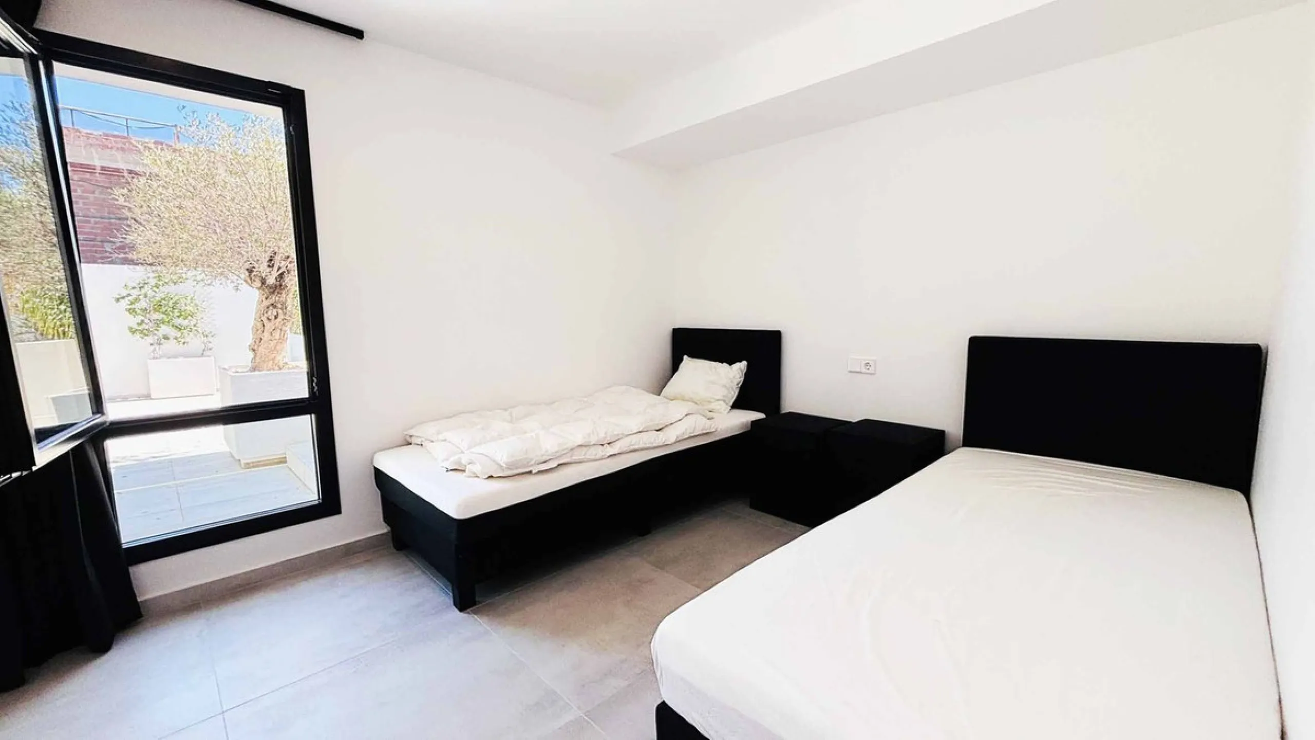 MODERN VILLA WITH SEA VIEWS JUST 200 METERS FROM THE BEACH FOR SALE IN EL CHAPARRAL, MIJAS COSTA