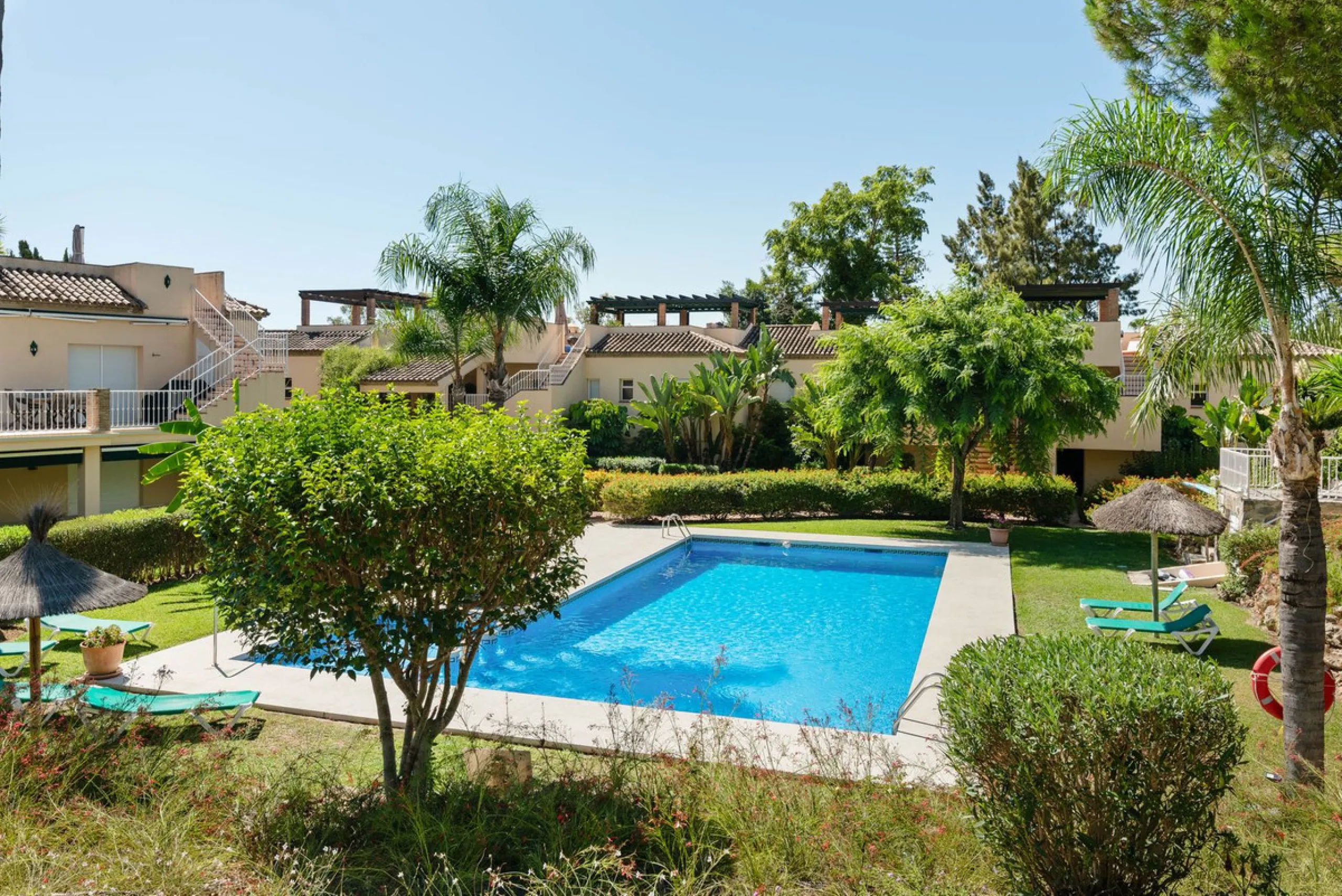 This stunning, fully furnished ground floor apartment offers 3 bedrooms and 2 bathrooms, located within a secure, gated development of just 18 residences. Residents enjoy access to two pristine swimming pools and beautifully maintained communal gardens.