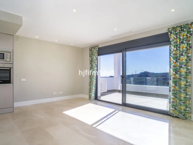 This stunning 2-bedroom duplex penthouse for sale in Ocean Hills, Estepona offers modern, luxurious living with breathtaking panoramic views of the Mediterranean Sea, the surrounding mountains, and the protected natural park that borders the community. Si