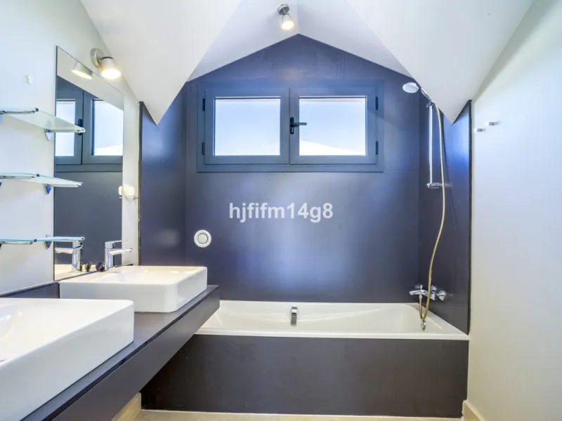 This stunning 2-bedroom duplex penthouse for sale in Ocean Hills, Estepona offers modern, luxurious living with breathtaking panoramic views of the Mediterranean Sea, the surrounding mountains, and the protected natural park that borders the community. Si