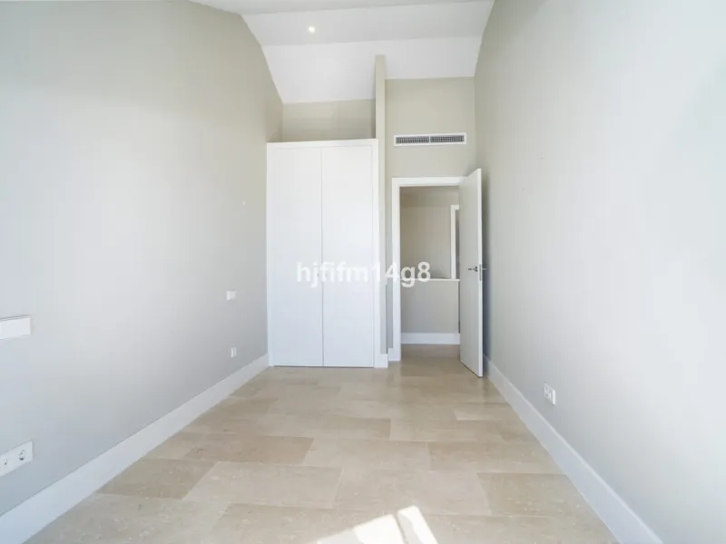 This stunning 2-bedroom duplex penthouse for sale in Ocean Hills, Estepona offers modern, luxurious living with breathtaking panoramic views of the Mediterranean Sea, the surrounding mountains, and the protected natural park that borders the community. Si