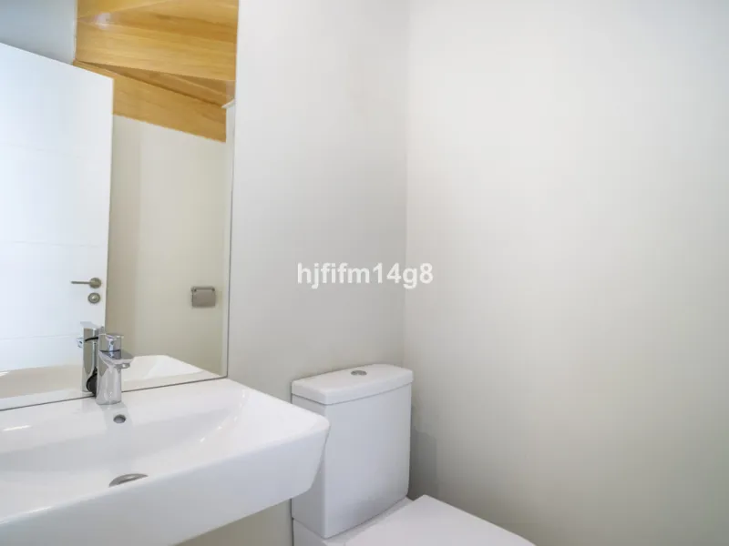 This stunning 2-bedroom duplex penthouse for sale in Ocean Hills, Estepona offers modern, luxurious living with breathtaking panoramic views of the Mediterranean Sea, the surrounding mountains, and the protected natural park that borders the community. Si