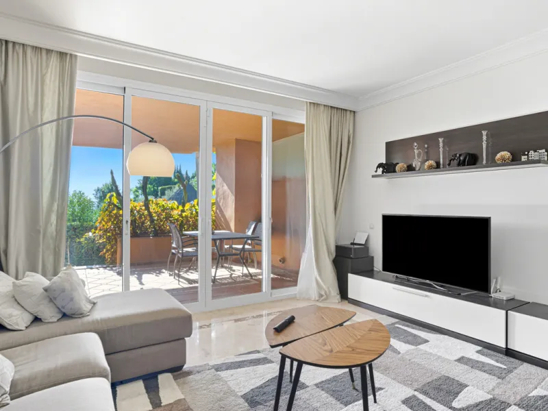 Elegant ground-floor apartment located in one of the most exclusive and peaceful developments in Nueva Andalucía. This carefully maintained property offers the perfect blend of comfort, privacy, and Mediterranean charm. It features two spacious bedrooms a