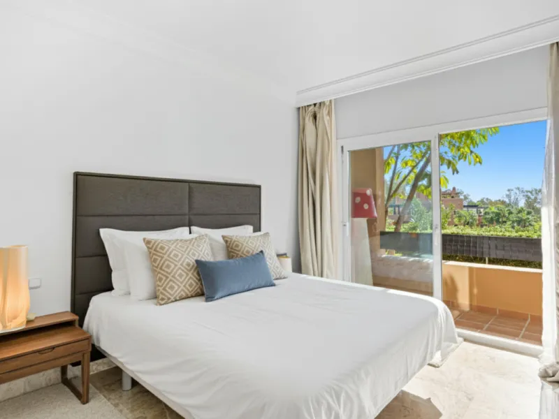 Elegant ground-floor apartment located in one of the most exclusive and peaceful developments in Nueva Andalucía. This carefully maintained property offers the perfect blend of comfort, privacy, and Mediterranean charm. It features two spacious bedrooms a