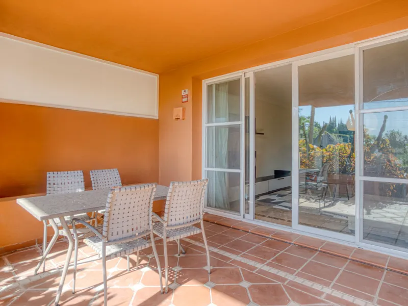 Elegant ground-floor apartment located in one of the most exclusive and peaceful developments in Nueva Andalucía. This carefully maintained property offers the perfect blend of comfort, privacy, and Mediterranean charm. It features two spacious bedrooms a