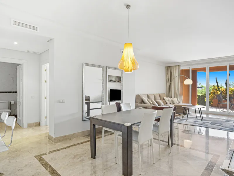 Elegant ground-floor apartment located in one of the most exclusive and peaceful developments in Nueva Andalucía. This carefully maintained property offers the perfect blend of comfort, privacy, and Mediterranean charm. It features two spacious bedrooms a