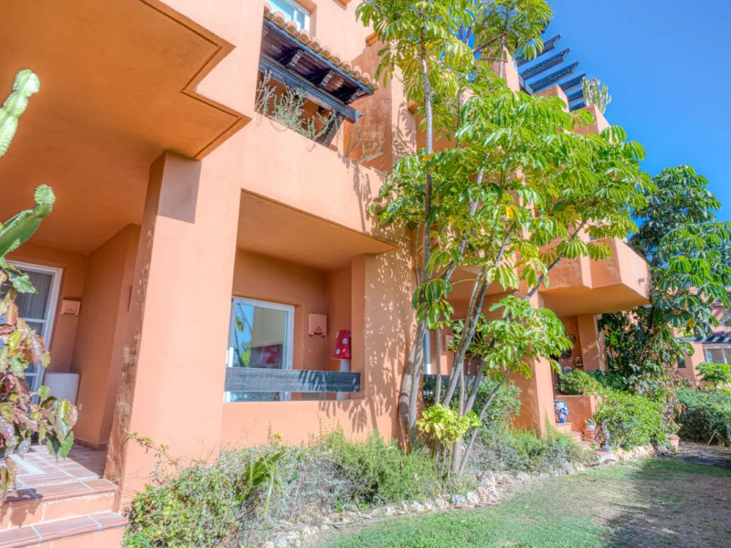 Elegant ground-floor apartment located in one of the most exclusive and peaceful developments in Nueva Andalucía. This carefully maintained property offers the perfect blend of comfort, privacy, and Mediterranean charm. It features two spacious bedrooms a