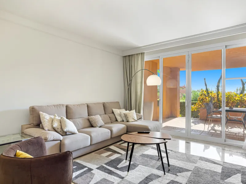 Elegant ground-floor apartment located in one of the most exclusive and peaceful developments in Nueva Andalucía. This carefully maintained property offers the perfect blend of comfort, privacy, and Mediterranean charm. It features two spacious bedrooms a