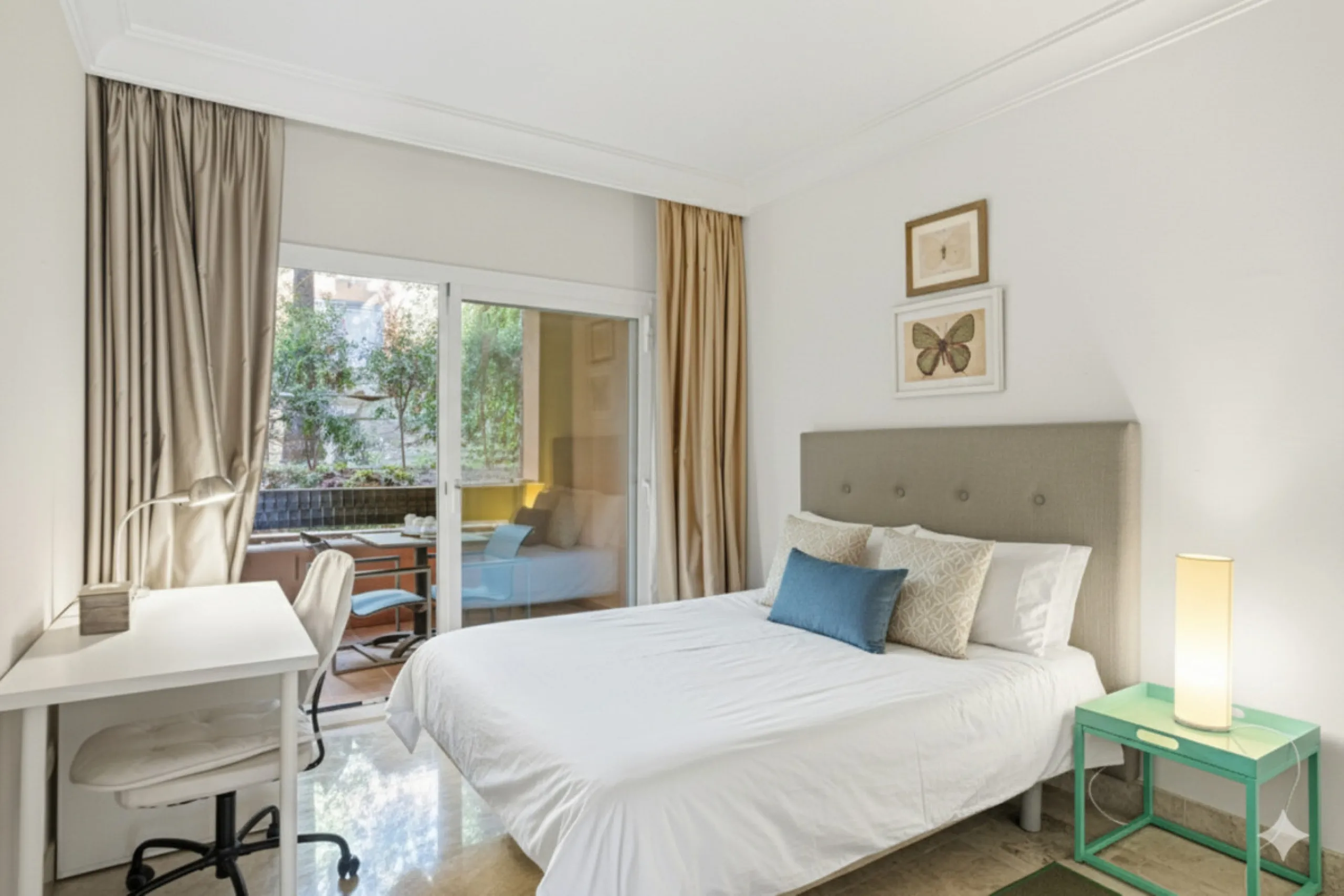 Elegant ground-floor apartment located in one of the most exclusive and peaceful developments in Nueva Andalucía. This carefully maintained property offers the perfect blend of comfort, privacy, and Mediterranean charm. It features two spacious bedrooms a