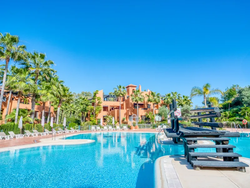 Elegant ground-floor apartment located in one of the most exclusive and peaceful developments in Nueva Andalucía. This carefully maintained property offers the perfect blend of comfort, privacy, and Mediterranean charm. It features two spacious bedrooms a