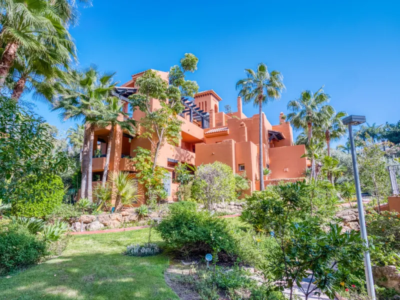 Elegant ground-floor apartment located in one of the most exclusive and peaceful developments in Nueva Andalucía. This carefully maintained property offers the perfect blend of comfort, privacy, and Mediterranean charm. It features two spacious bedrooms a