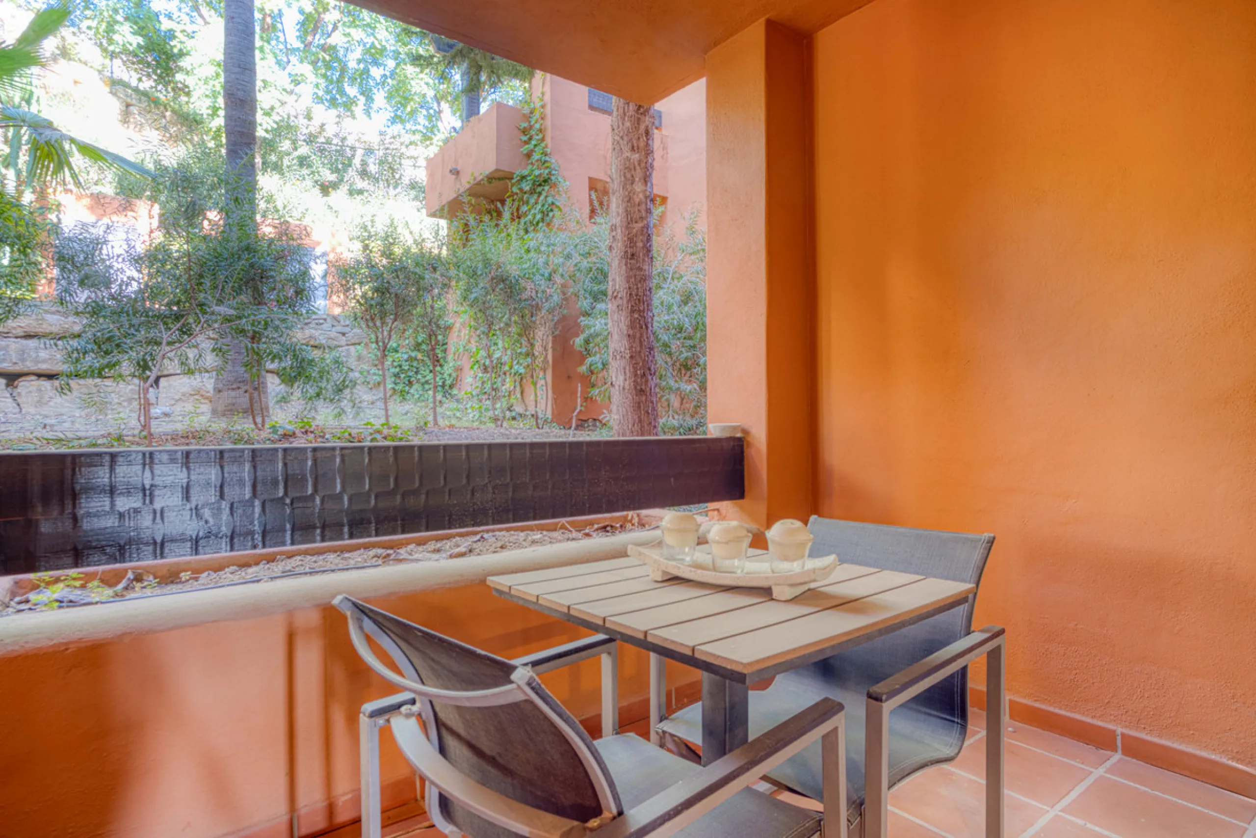 Elegant ground-floor apartment located in one of the most exclusive and peaceful developments in Nueva Andalucía. This carefully maintained property offers the perfect blend of comfort, privacy, and Mediterranean charm. It features two spacious bedrooms a