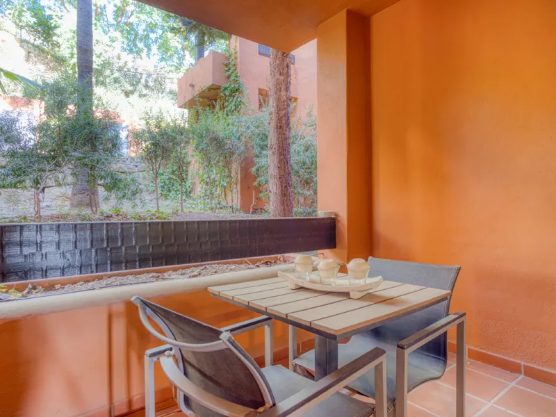 Elegant ground-floor apartment located in one of the most exclusive and peaceful developments in Nueva Andalucía. This carefully maintained property offers the perfect blend of comfort, privacy, and Mediterranean charm. It features two spacious bedrooms a