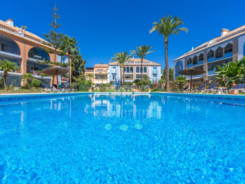Stunning mid-floor apartment in the first line of the beach, with spectacular views of the sea, the beach, Gibraltar, and Africa, located in the exclusive Bay of Casares next to a protected historic area with an ancient Arab tower, within the prestigious 
