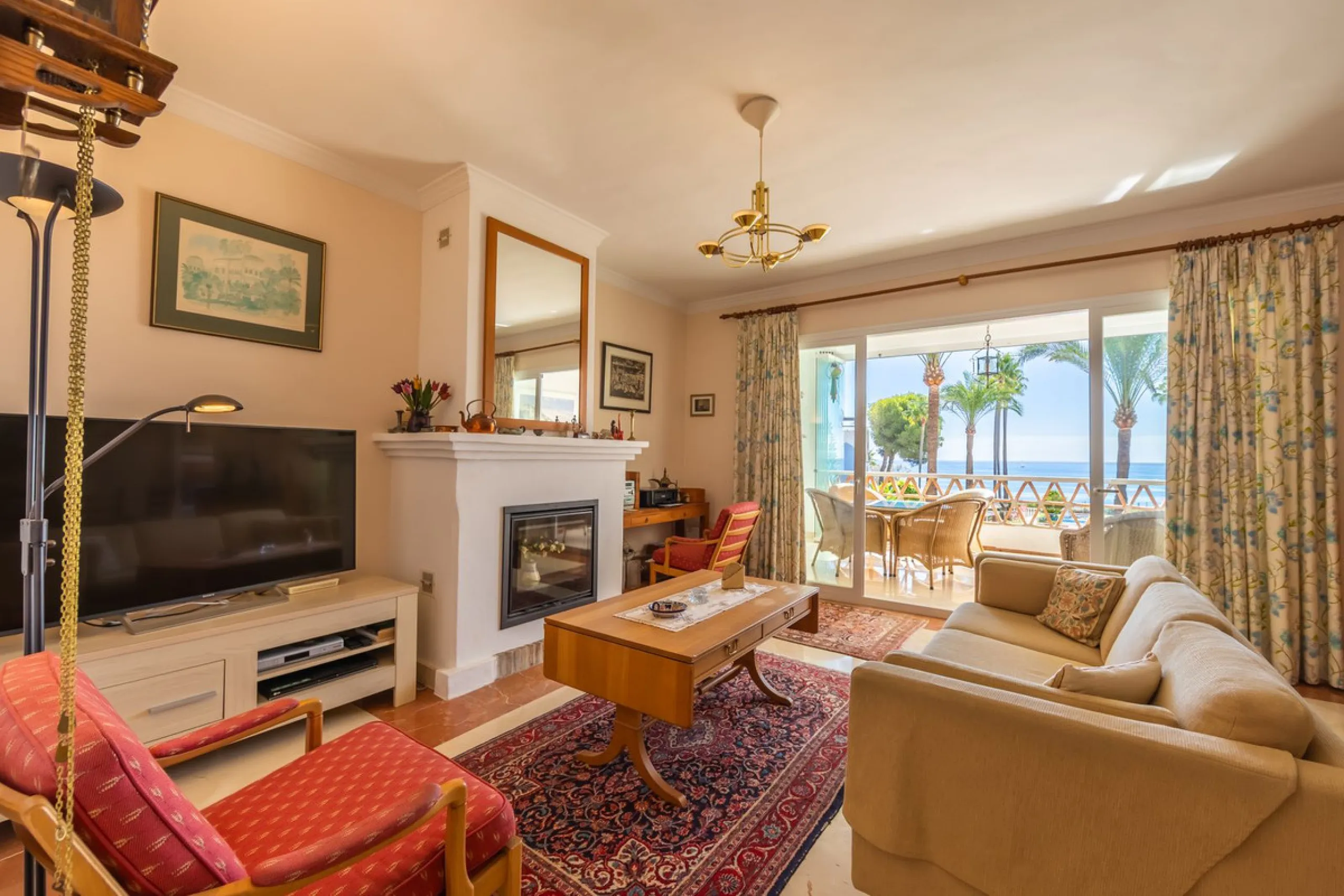Stunning mid-floor apartment in the first line of the beach, with spectacular views of the sea, the beach, Gibraltar, and Africa, located in the exclusive Bay of Casares next to a protected historic area with an ancient Arab tower, within the prestigious 