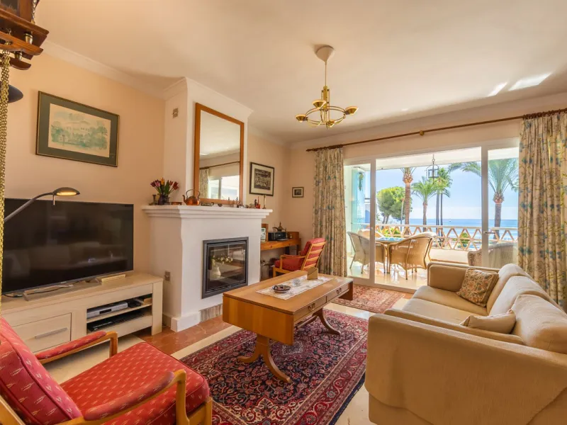 Stunning mid-floor apartment in the first line of the beach, with spectacular views of the sea, the beach, Gibraltar, and Africa, located in the exclusive Bay of Casares next to a protected historic area with an ancient Arab tower, within the prestigious 