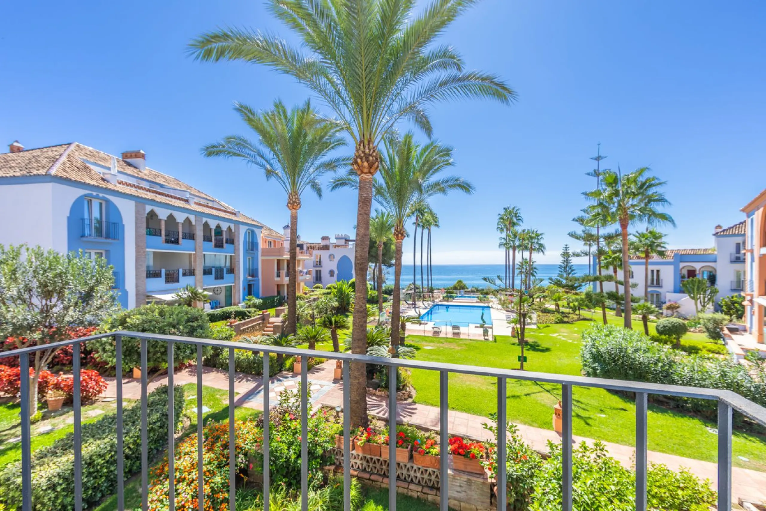 Stunning mid-floor apartment in the first line of the beach, with spectacular views of the sea, the beach, Gibraltar, and Africa, located in the exclusive Bay of Casares next to a protected historic area with an ancient Arab tower, within the prestigious 