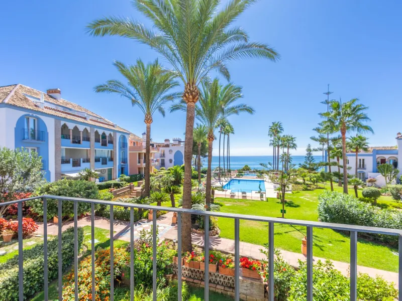 Stunning mid-floor apartment in the first line of the beach, with spectacular views of the sea, the beach, Gibraltar, and Africa, located in the exclusive Bay of Casares next to a protected historic area with an ancient Arab tower, within the prestigious 