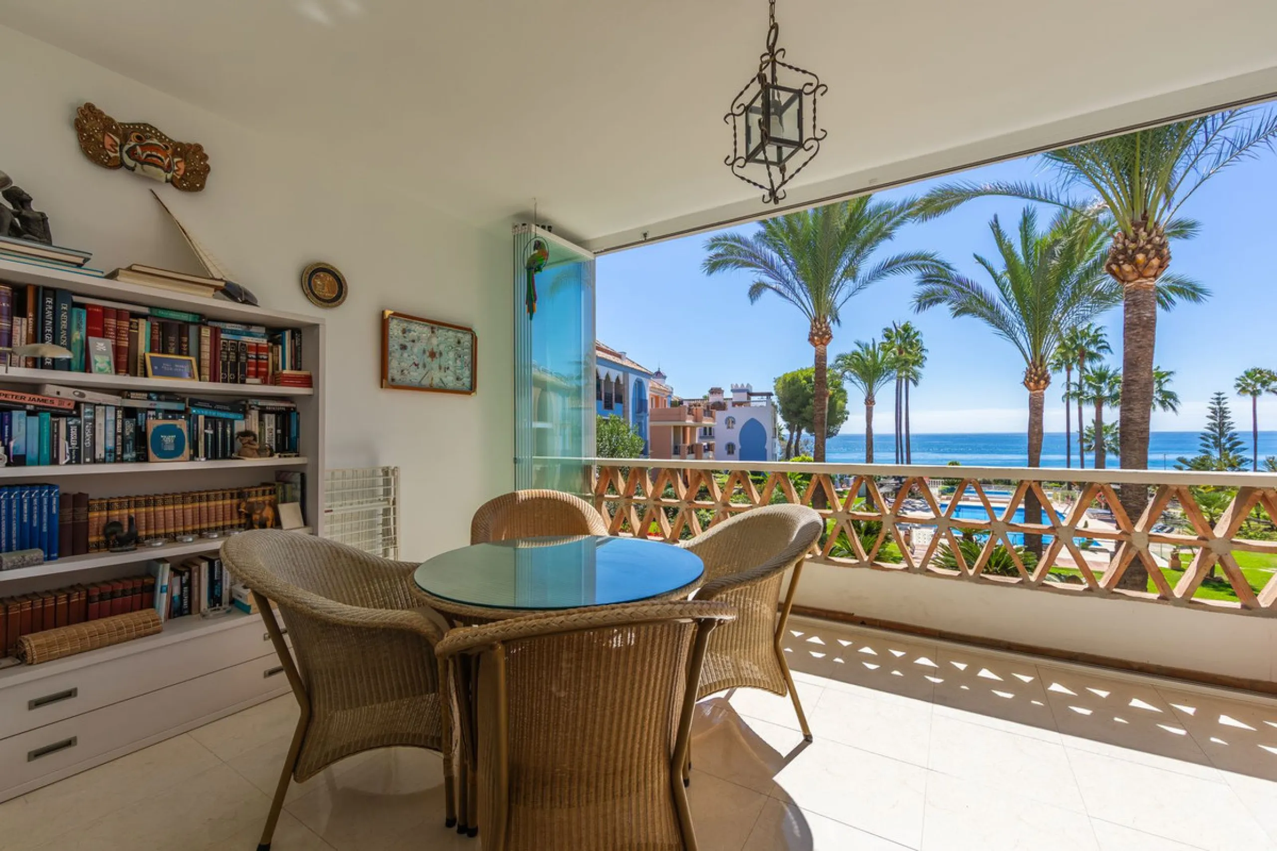 Stunning mid-floor apartment in the first line of the beach, with spectacular views of the sea, the beach, Gibraltar, and Africa, located in the exclusive Bay of Casares next to a protected historic area with an ancient Arab tower, within the prestigious 