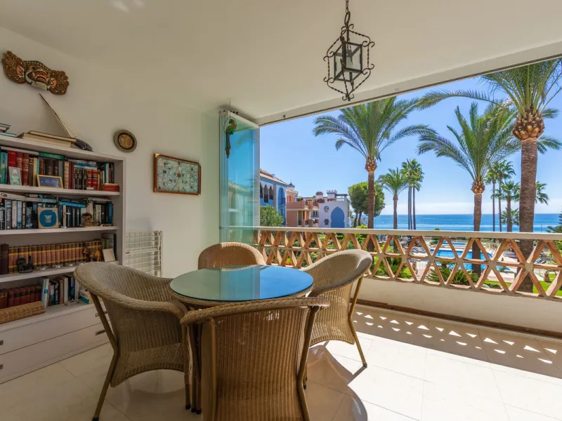 Stunning mid-floor apartment in the first line of the beach, with spectacular views of the sea, the beach, Gibraltar, and Africa, located in the exclusive Bay of Casares next to a protected historic area with an ancient Arab tower, within the prestigious 
