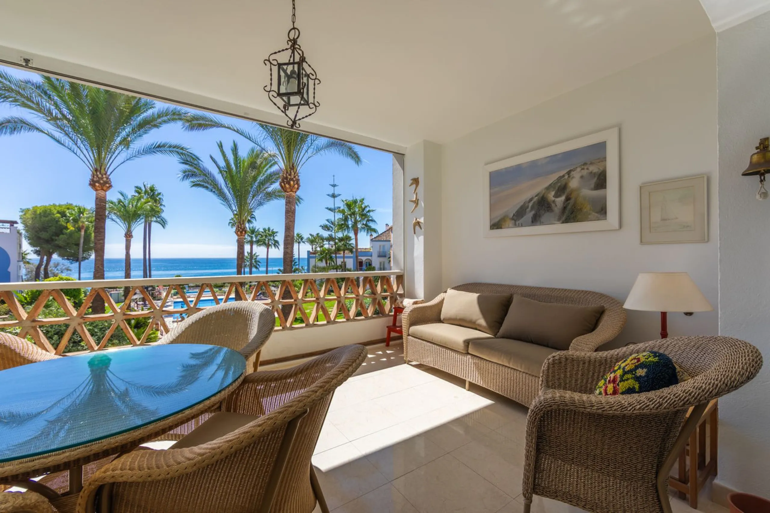 Stunning mid-floor apartment in the first line of the beach, with spectacular views of the sea, the beach, Gibraltar, and Africa, located in the exclusive Bay of Casares next to a protected historic area with an ancient Arab tower, within the prestigious 