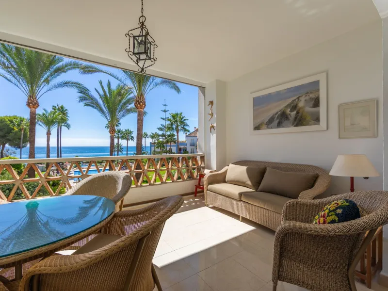 Stunning mid-floor apartment in the first line of the beach, with spectacular views of the sea, the beach, Gibraltar, and Africa, located in the exclusive Bay of Casares next to a protected historic area with an ancient Arab tower, within the prestigious 