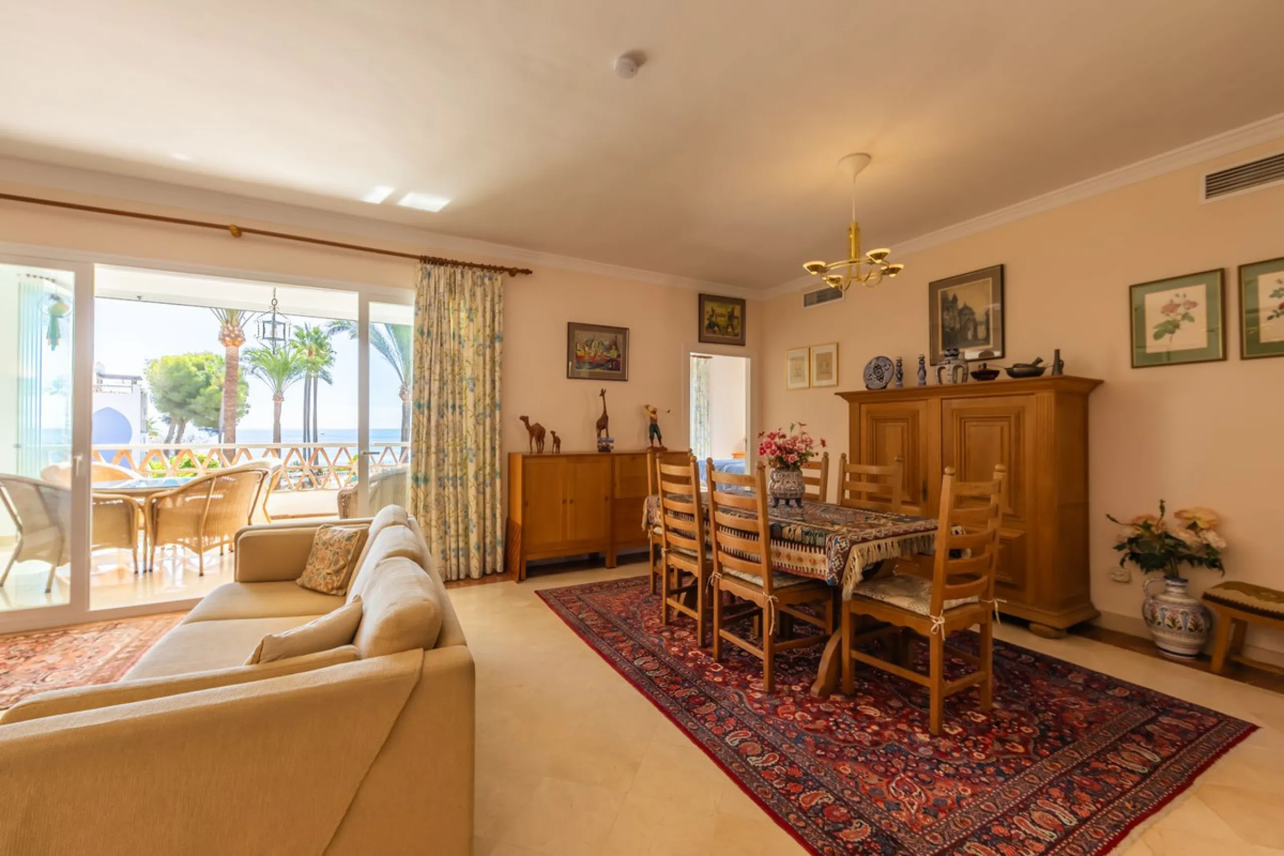 Stunning mid-floor apartment in the first line of the beach, with spectacular views of the sea, the beach, Gibraltar, and Africa, located in the exclusive Bay of Casares next to a protected historic area with an ancient Arab tower, within the prestigious 