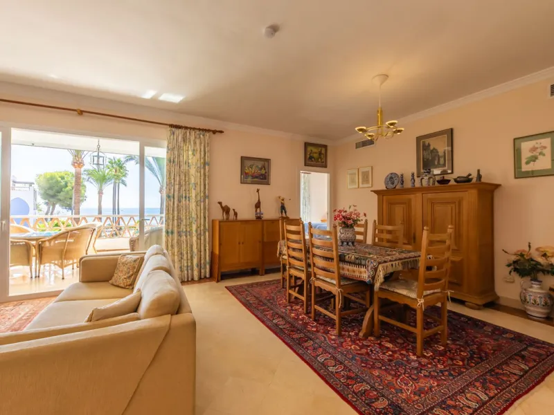 Stunning mid-floor apartment in the first line of the beach, with spectacular views of the sea, the beach, Gibraltar, and Africa, located in the exclusive Bay of Casares next to a protected historic area with an ancient Arab tower, within the prestigious 