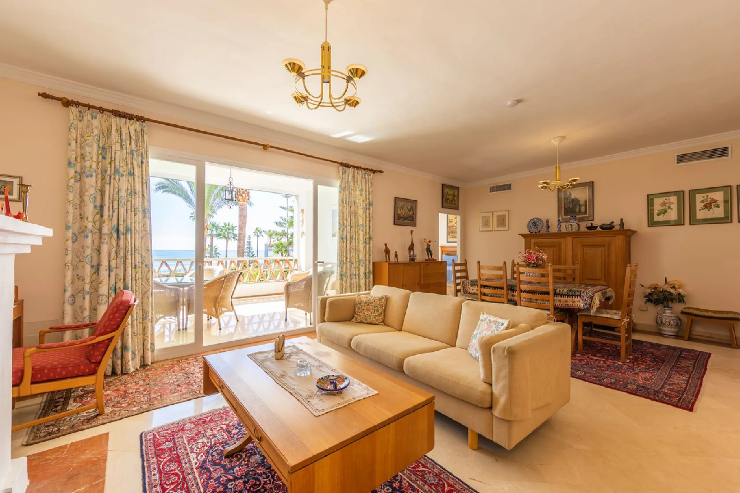 Stunning mid-floor apartment in the first line of the beach, with spectacular views of the sea, the beach, Gibraltar, and Africa, located in the exclusive Bay of Casares next to a protected historic area with an ancient Arab tower, within the prestigious 