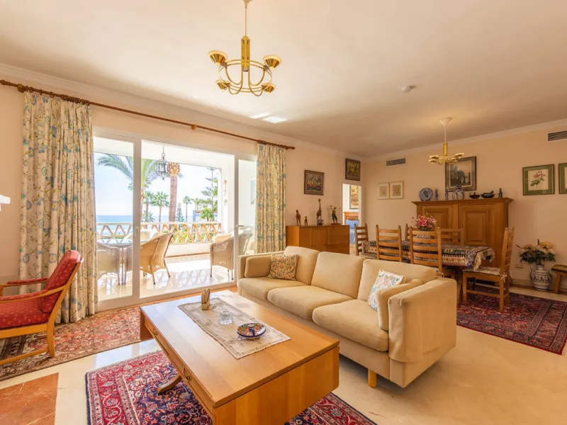 Stunning mid-floor apartment in the first line of the beach, with spectacular views of the sea, the beach, Gibraltar, and Africa, located in the exclusive Bay of Casares next to a protected historic area with an ancient Arab tower, within the prestigious 