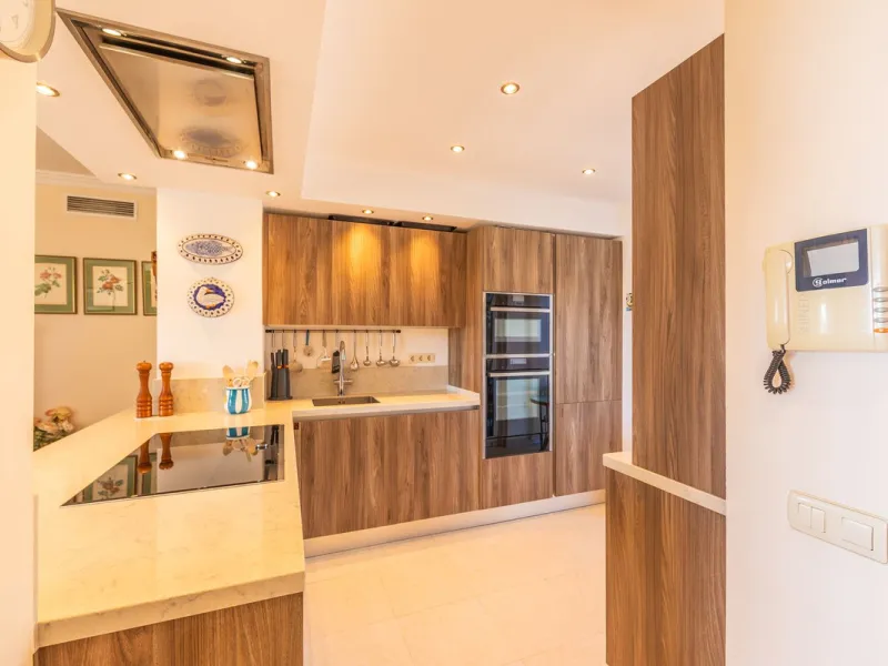 Stunning mid-floor apartment in the first line of the beach, with spectacular views of the sea, the beach, Gibraltar, and Africa, located in the exclusive Bay of Casares next to a protected historic area with an ancient Arab tower, within the prestigious 