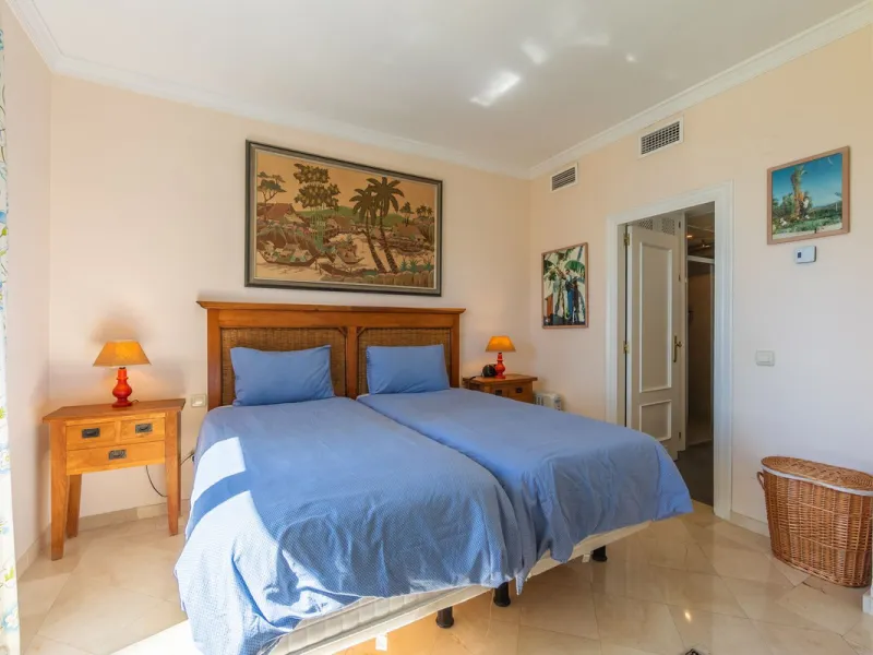 Stunning mid-floor apartment in the first line of the beach, with spectacular views of the sea, the beach, Gibraltar, and Africa, located in the exclusive Bay of Casares next to a protected historic area with an ancient Arab tower, within the prestigious 