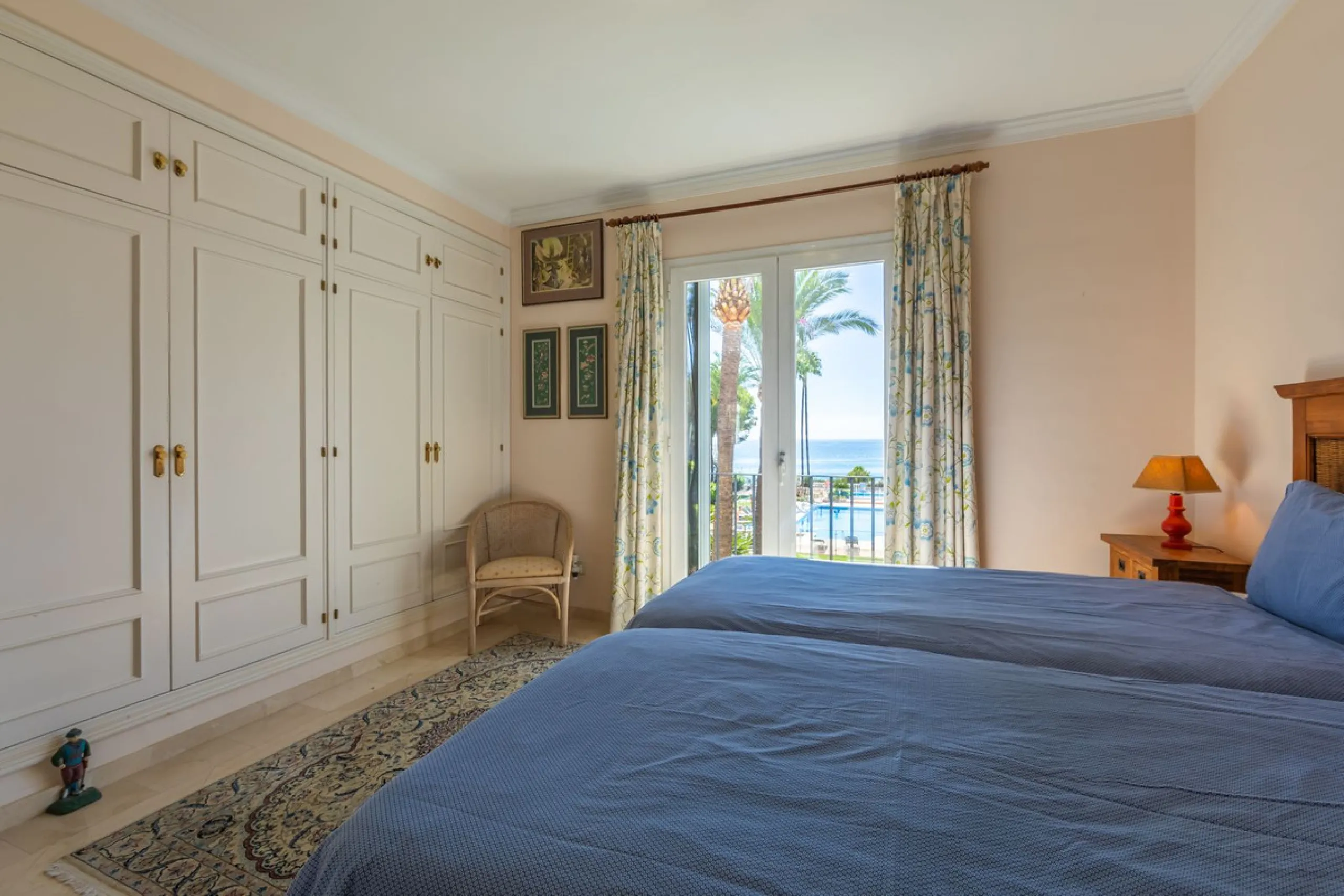 Stunning mid-floor apartment in the first line of the beach, with spectacular views of the sea, the beach, Gibraltar, and Africa, located in the exclusive Bay of Casares next to a protected historic area with an ancient Arab tower, within the prestigious 