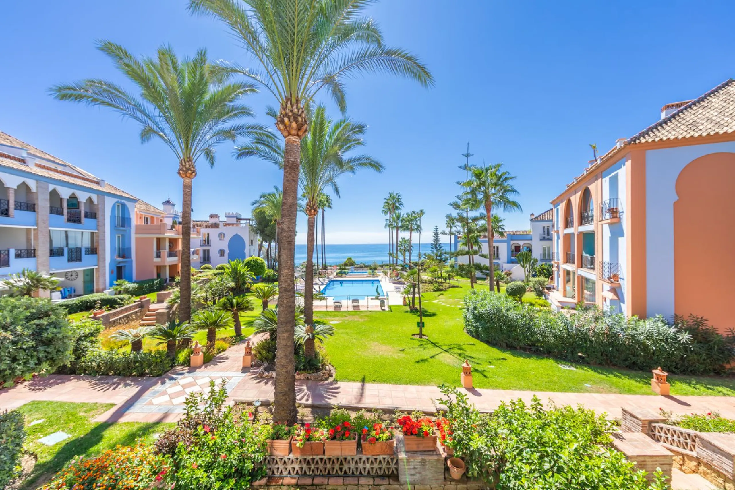 Stunning mid-floor apartment in the first line of the beach, with spectacular views of the sea, the beach, Gibraltar, and Africa, located in the exclusive Bay of Casares next to a protected historic area with an ancient Arab tower, within the prestigious 