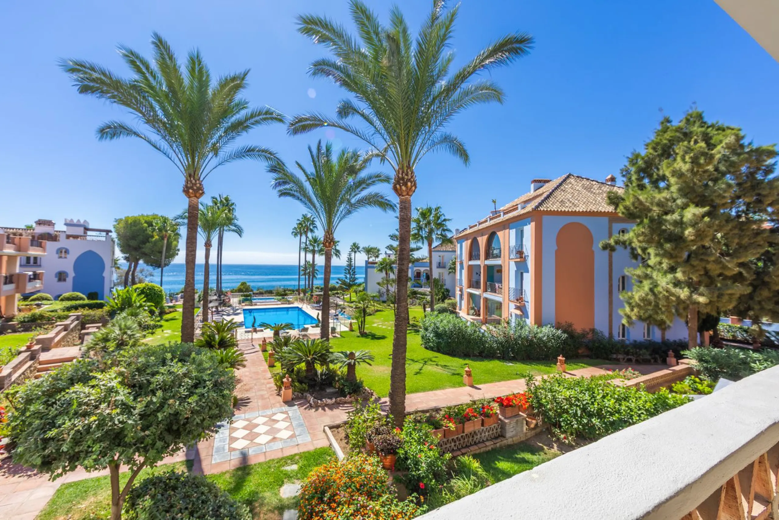 Stunning mid-floor apartment in the first line of the beach, with spectacular views of the sea, the beach, Gibraltar, and Africa, located in the exclusive Bay of Casares next to a protected historic area with an ancient Arab tower, within the prestigious 