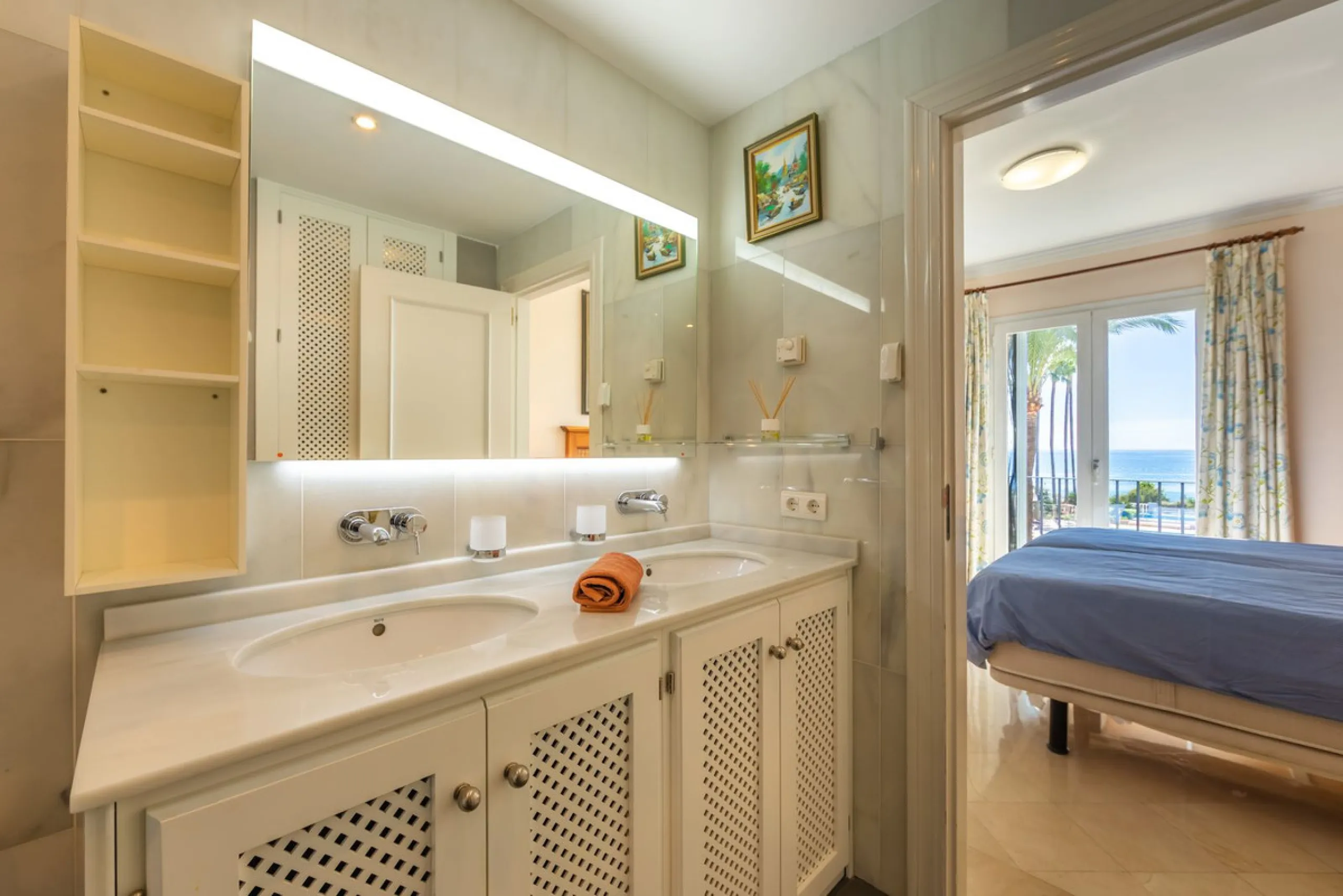 Stunning mid-floor apartment in the first line of the beach, with spectacular views of the sea, the beach, Gibraltar, and Africa, located in the exclusive Bay of Casares next to a protected historic area with an ancient Arab tower, within the prestigious 
