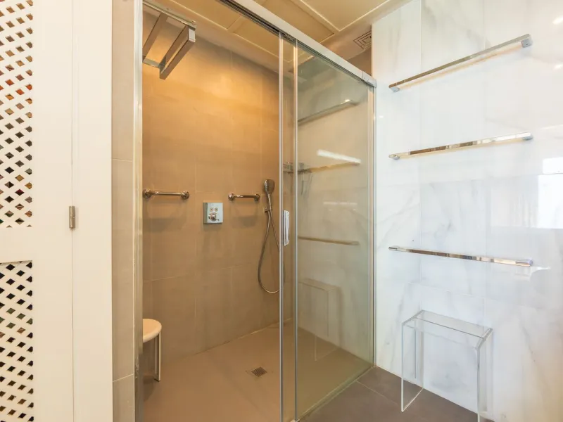 Stunning mid-floor apartment in the first line of the beach, with spectacular views of the sea, the beach, Gibraltar, and Africa, located in the exclusive Bay of Casares next to a protected historic area with an ancient Arab tower, within the prestigious 