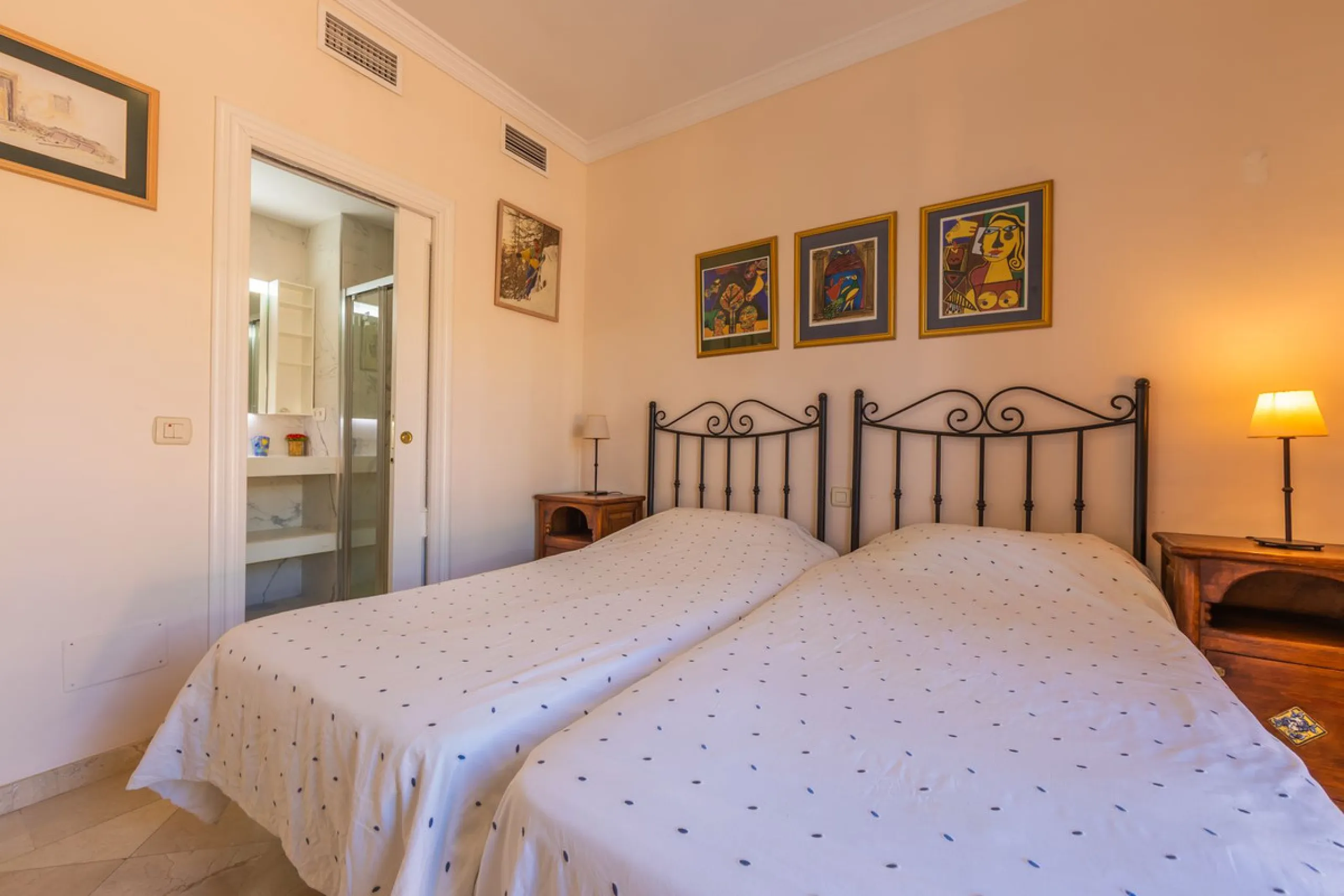 Stunning mid-floor apartment in the first line of the beach, with spectacular views of the sea, the beach, Gibraltar, and Africa, located in the exclusive Bay of Casares next to a protected historic area with an ancient Arab tower, within the prestigious 