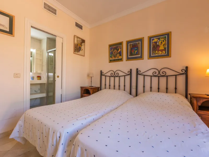 Stunning mid-floor apartment in the first line of the beach, with spectacular views of the sea, the beach, Gibraltar, and Africa, located in the exclusive Bay of Casares next to a protected historic area with an ancient Arab tower, within the prestigious 